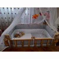 تخت کودک کنار تخت مادر