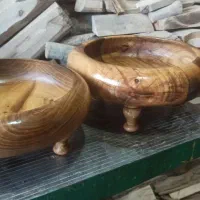 تخت سنتی . ظروف چوبی . تخت خواب تمام چوب