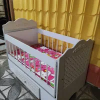 تخت گهواره ای نوزاد