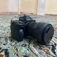 دوربین alpha 7 IV + لنز sigma28-70mm dn I