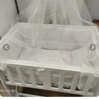 گهواره کنار تخت مادر