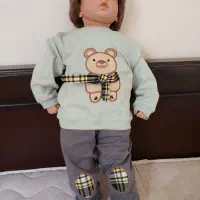 عروسک قدیمی بزرگ اندازه بچه لباس تنش نو