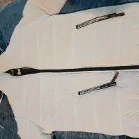 کاپشن|لباس|قره ضیاالدین, |دیوار