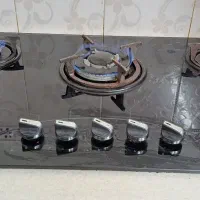 گاز شیشه ای رومیزی ۵ شعله ..کار کرده ..سالم