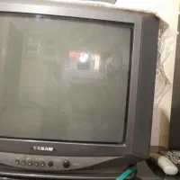 یک عدد تلوزیون و زیر تلوزیون شیشیه