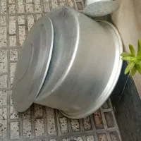 قابلمه رویی نونو با دوتا کفگیر ملاقه