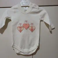 چند دست لباس نوزادی