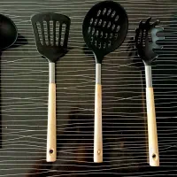 دو عدد سرویس کفگیر ملاقه چوبی و نسوز