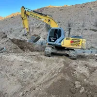 بیل مکانیکی زنجیری با پیکور آماده همکاری