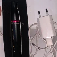 یک عدد دستگاه تتو