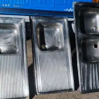 تعدادی لگن آشپزخانه و تخت ایپلاسیون