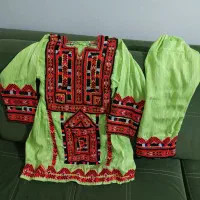 دو عدد لباس بچه‌گانه دست‌دوز