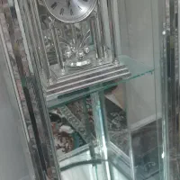 اینه شمعدان وپایه شیشه‌ای