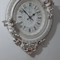 ساعت دیواری طرح فرشته برجسته