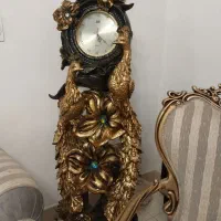 ساعت ایستاده مدل طاووس طلایی