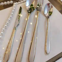 سرویس قاشق چنگال  آکبند خارجی کنسول چوبی