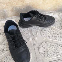 پالتو و بوت قهوه‌ای|کیف، کفش، کمربند|تاکستان, |دیوار