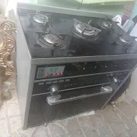 اجاق گاز طرح فر رویش شیشه هستش سالم
