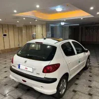 پژو ۲۰۶ تیپ ۳ مدل ۱۴۰۲ سقف شیشه تک برگ سند|خودرو سواری و وانت|تهران, شهرک فردوس (حسینی)|دیوار