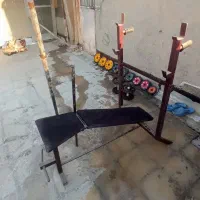 میز پرس سینه به همراه وزنه