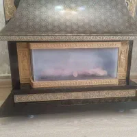 بخاری شومینه گلکاران دوشعله