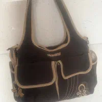 ساک کودک‌و چمدان بچه‌وآغوشی