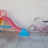 دوچرخه ۱۶ ویک عدد سرسره کودک