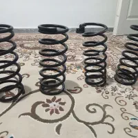 فنر لول پراید و رادیاتور پراید و چراغ جلو پژو پارس