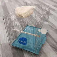 قفس پرنده با غذا