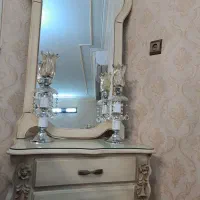 آیینه و شمعدان|آینه|ری, جوانمرد قصاب|دیوار