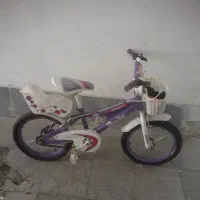 دوچرخه دخترانه و لوازم دیگه عکسا نگاه کنید