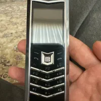 گوشی طرح ورتو دو سیم کارت با کارتون دفترچه و شارژر