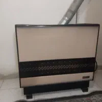 بخاری درحال استفاده سالم|بخاری، هیتر، شومینه|لاهیجان, کوی آزادگان|دیوار