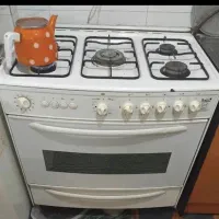 گاز فردا ۵شعله درب دار صفحه لعابی کارکرده سالم