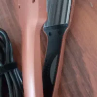 اتو وحالت دهنده مو Rollan