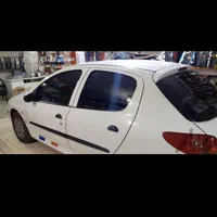 شیشه دودی برچسب(درمحل)|خدمات موتور و ماشین|هشتگرد, هشتگرد قدیم|دیوار