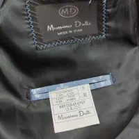 کت و شلوار|لباس|قم, باغ کرباسی|دیوار