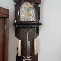 ساعت دیواری آونگ دار