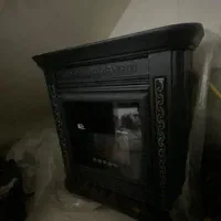 بخاری طرح شومینه مشهد دوام|بخاری، هیتر، شومینه|شیراز, کوشک میدان|دیوار