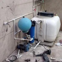 تاسیسات لوله کشی اب نصب پمپ ومنبع ابگرمکن شیرالات