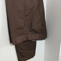 یک شلوار و پیراهن مدرسه ای کاملا نو