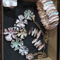 چهار تیکه ست گوشوار انگشتر اکبن جنسش اب طلا