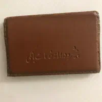 کیف مدارک شناسایی رنگ زرشکی به نام حسین زارع
