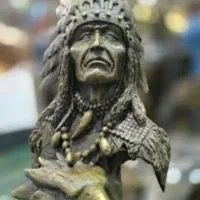 ‌ مجسمه مشهور برنز موزه لوور (سردیس یک ایرانی )