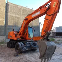 بیل مکانیکی دوسان لاستیکی