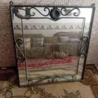 اینه با قاب اهنی