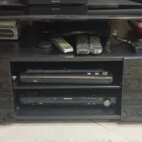 میز تلویزیون مشکی شیشه‌ای