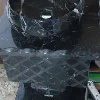 روشویی سنگی همراه با قاب آینه