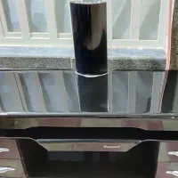 زیر تلوزیونی شیشه ای نو
