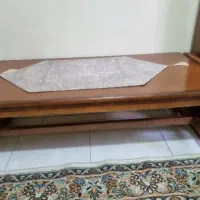 شیشه روی میز تراش داده شده ومیز جلو مبلی